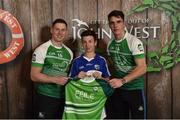 11 June 2016; U14 Féile Peil na nÓg participant Brian Whelan from Ballyroan Abbey GAA Club, Co. Laois, being presented with a commemorative jersey by John West ambassadors, Philly McMahon, left, and Danny Sutcliffe, at the John West Féile National Skills Star Challenge 2016, in the National Games Development Centre, Abbotstown, Dublin. Photo by Sportsfile