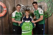 11 June 2016; U14 Féile Peil na nÓg participant Jack Lundy from Co. Dublin being presented with a commemorative jersey by John West ambassadors, Philly McMahon, left, and Danny Sutcliffe, at the John West Féile National Skills Star Challenge 2016, in the National Games Development Centre, Abbotstown, Dublin. Photo by Sportsfile