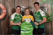 11 June 2016; U14 Féile Peil na nÓg participant Ruairi O' Boyle from St. Mary's Rasharkin GAA Club, Co. Antrim, being presented with a commemorative jersey by John West ambassadors, Philly McMahon, left, and Danny Sutcliffe, at the John West Féile National Skills Star Challenge 2016, in the National Games Development Centre, Abbotstown, Dublin. Photo by Sportsfile