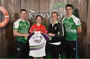 11 June 2016; U14 Féile na nGael participant Caoimhe Buckley from Inniscarra Gaa Club, Co. Cork, being presented with a commemorative jersey by John West ambassadors, Philly McMahon, left, and Danny Sutcliffe and Edwina Keane, Kilkenny camogie player, at the John West Féile National Skills Star Challenge 2016, at the  in the National Games Development Centre, Abbotstown, Dublin. Photo by Sportsfile