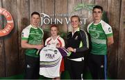 11 June 2016; U14 Féile na nGael participant Roisin Gallagher from Wolfe Tones Bellaghy GAA Club, Co. Derry, being presented with a commemorative jersey by John West ambassadors, Philly McMahon, left, and Danny Sutcliffe and Edwina Keane, Kilkenny camogie player, at the John West Féile National Skills Star Challenge 2016, at the  in the National Games Development Centre, Abbotstown, Dublin. Photo by Sportsfile