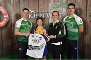 11 June 2016; U14 Féile na nGael participant Katie Tyrrell from Donard/Glen GAA Club, Co. Wicklow, being presented with a commemorative jersey by John West ambassadors, Philly McMahon, left, and Danny Sutcliffe and Edwina Keane, Kilkenny camogie player, at the John West Féile National Skills Star Challenge 2016, at the  in the National Games Development Centre, Abbotstown, Dublin. Photo by Sportsfile