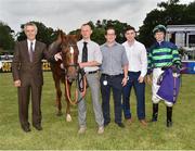 9 June 2016; Trainer Jim Bolger, from left, owner Michael D. Ryan, Paraic McDevitt, and jockey Kevin Manning after winning the Friends of Dublin Football Maiden on An Cailin Orga, during the Bulmer's Evening Meeting in Leopardstown, Co. Dublin. Photo by Cody Glenn/Sportsfile