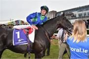9 June 2016; Kevin Manning dismounts Mandatario after winning the Coral.ie Handicap during the Bulmer's Evening Meeting in Leopardstown, Co. Dublin. Photo by Cody Glenn/Sportsfile