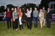 9 June 2016; Jockey Ana O'Brien, her brother/trainer Joseph O'Brien, fifth from right, and the winning connections of No Biggie in the winner's enclosure following the Copper Face Jacks Handicap during the Bulmer's Evening Meeting in Leopardstown, Co. Dublin. Photo by Cody Glenn/Sportsfile