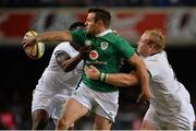 11 June 2016; Jared Payne of Ireland offloads a pass while being tackled by Lwazi Mvovo, left, and Adriaan Strauss of South Africa during the 1st test of the Castle Lager Incoming series between South Africa and Ireland at the DHL Newlands Stadium in Cape Town, South Africa. Photo by Brendan Moran/Sportsfile