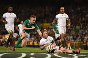 11 June 2016; Faf de Klerk of South Africa gets to the ball ahead of Paddy Jackson of Ireland during the 1st test of the Castle Lager Incoming series between South Africa and Ireland at the DHL Newlands Stadium in Cape Town, South Africa. Photo by Brendan Moran/Sportsfile