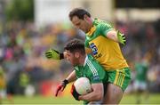 12 June 2016; Barry Mulrone Fermanagh in action against Micheal Murphy of Donegal in the Ulster GAA Football Senior Championship Quarter-Final match between Donegal and Fermanagh at MacCumhaill Park in Ballybofey, Co. Donegal. Photo by Philip Fitzpatrick/Sportsfile