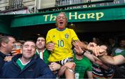 12 June 2016; Republic of Ireland supporters with a Sweden supporter outside the Harp Bar, Montmartre, at UEFA Euro 2016 in Paris, France. Photo by Stephen McCarthy/Sportsfile