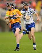 11 July 2010; Tony Kelly, Clare, in action against Raymond Barry, Waterford. ESB Munster GAA Hurling Minor Championship Final, Waterford v Clare, Semple Stadium, Thurles, Co. Tipperary. Picture credit: Stephen McCarthy / SPORTSFILE