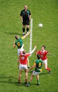 11 July 2010; Referee Martin Sludden throws the ball in between Meath's Nigel Crawford, 6, and Brian Meade, 8, and Louth's Paddy Keenan, 8, and Brian White, 9, for the start of the second half. Leinster GAA Football Senior Championship Final, Meath v Louth, Croke Park, Dublin. Picture credit: David Maher / SPORTSFILE