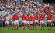 11 July 2010; The Cork team stand for the national anthem. Munster GAA Hurling Senior Championship Final, Cork v Waterford, Semple Stadium, Thurles, Co. Tipperary. Picture credit: Barry Cregg / SPORTSFILE