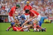 11 July 2010; Shane Walsh, left and Kevin Moran, Waterford, in action against Brian Murphy, left, Ronan Curran and Shane O' Neill, right, Cork. Munster GAA Hurling Senior Championship Final, Cork v Waterford, Semple Stadium, Thurles, Co. Tipperary. Picture credit: Barry Cregg / SPORTSFILE