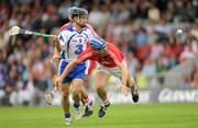 11 July 2010; Ronan Curran, Cork, in action against Eoin McGrath, Waterford. Munster GAA Hurling Senior Championship Final, Cork v Waterford, Semple Stadium, Thurles, Co. Tipperary. Picture credit: Ray McManus / SPORTSFILE