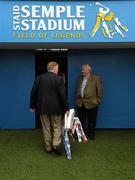 11 July 2010; Munster PRO, Jim Forbes, leaves the field with the Munster Hurling Final Trophy. Munster GAA Hurling Senior Championship Final, Cork v Waterford, Semple Stadium, Thurles, Co. Tipperary. Picture credit: Ray McManus / SPORTSFILE