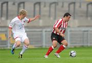 13 July 2010; Andy Reid, Sunderland, in action against David O'Leary, Munster XI. Friendly in Aid of Shane Geoghegan Trust, Munster XI v Sunderland AFC, Thomond Park, Limerick. Picture credit: Diarmuid Greene / SPORTSFILE