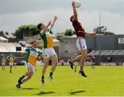 12 June 2016; John Heslin of Westmeath in action against Sean Pender, centre, and Brian Darby, left, of Offaly during the Leinster GAA Football Senior Championship Quarter-Final match between Westmeath and Offaly at Cusack Park in Mullingar, Co. Westmeath. Photo by Seb Daly/Sportsfile