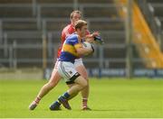 12 June 2016; Brian Fox of Tipperary in action against Colm O'Neill of Cork during their Munster GAA Football Senior Championship Semi-Final match between Tipperary and Cork at Semple Stadium in Thurles, Co Tipperary. Photo by Piaras Ó Mídheach/Sportsfile