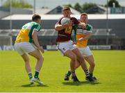 12 June 2016; John Heslin of Westmeath in action against Sean Pender, left, and Brian Darby, right, of Offaly during the Leinster GAA Football Senior Championship Quarter-Final match between Westmeath and Offaly at Cusack Park in Mullingar, Co. Westmeath. Photo by Seb Daly/Sportsfile