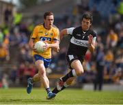 12 June 2016; Conor Devenney of Roscommon in action against Brendan Egan of Sligo during their Connacht GAA Football Senior Championship Semi-Final match between Roscommon and Sligo at Dr. Hyde Park in Roscommon. Photo by Ray McManus/Sportsfile