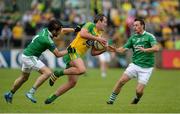 12 June 2016; Michael Murphy of Donegal in action against Marty O'Brien and Damian Kelly of Fermanagh during their Ulster GAA Football Senior Championship Quarter-Final match between Fermanagh and Donegal at MacCumhaill Park in Ballybofey, Co. Donegal. Photo by Oliver McVeigh/Sportsfile