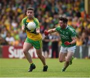 12 June 2016; Neil McGee of Donegal in action against Barry Mulrone of Fermanagh during their Ulster GAA Football Senior Championship Quarter-Final match between Donegal and Fermanagh at MacCumhaill Park in Ballybofey, Co. Donegal. Photo by Philip Fitzpatrick/Sportsfile