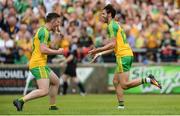 12 June 2016; Odhran MacNiallais of Donegal, right, celebrates with Patrick McBrearty after scoring his side's second goal during their Ulster GAA Football Senior Championship Quarter-Final match between Fermanagh and Donegal at MacCumhaill Park in Ballybofey, Co. Donegal. Photo by Oliver McVeigh/Sportsfile