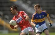 12 June 2016; Kevin O'Driscoll of Cork in action against Brian Fox of Tipperary during their Munster GAA Football Senior Championship Semi-Final match between Tipperary and Cork at Semple Stadium in Thurles, Co Tipperary. Photo by Piaras Ó Mídheach/Sportsfile