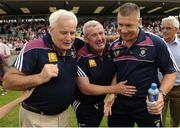 12 June 2016; Westmeath manager Tom Cribbin, right, celebrates with selector Alan McCormack, centre, and Westmeath GAA Football Committee Chairman Dermot Fox, left, following their team's victory during the Leinster GAA Football Senior Championship Quarter-Final match between Westmeath and Offaly at Cusack Park in Mullingar, Co. Westmeath. Photo by Seb Daly/Sportsfile