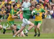12 June 2016; Che Cullen of Fermanagh in action against Martin McElhinney of Donegal during their Ulster GAA Football Senior Championship Quarter-Final match between Fermanagh and Donegal at MacCumhaill Park in Ballybofey, Co. Donegal. Photo by Oliver McVeigh/Sportsfile