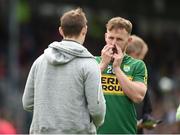 12 June 2016; Barry John Keane of Kerry, alongside team-mate James O'Donoghue, uses some nasal spray before their Munster GAA Football Senior Championship Semi-Final match with Clare at Fitzgerald Stadium in Killarney, Co. Kerry. Photo by Diarmuid Greene/Sportsfile