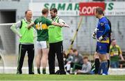 12 June 2016; Colm Cooper of Kerry is assessed by team physio Eddie Hartnett and team doctor Michael Finnerty after a clash of heads with Cathal O'Connor of Clare during their Munster GAA Football Senior Championship Semi-Final match at Fitzgerald Stadium in Killarney, Co. Kerry. Photo by Diarmuid Greene/Sportsfile