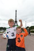 12 June 2016; Republic of Ireland supporters James, age 8, and Darragh Roche, age 6, from Firhouse, Dublin, are photographed in front of the Eiffel Tower at UEFA Euro 2016 in Paris, France. Photo by Stephen McCarthy/Sportsfile
