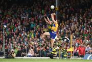 12 June 2016; Gary Brennan of Clare contests a high ball with Kieran Donaghy of Kerry during their Munster GAA Football Senior Championship Semi-Final match at Fitzgerald Stadium in Killarney, Co. Kerry. Photo by Diarmuid Greene/Sportsfile