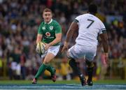 11 June 2016; Paddy Jackson of Ireland in action against Siya Kolisi of South Africa during the 1st test of the Castle Lager Incoming series between South Africa and Ireland at the DHL Newlands Stadium in Cape Town, South Africa. Photo by Brendan Moran/Sportsfile