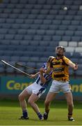 11 June 2016; Robbie Codd of Rathnure wins a penalty as he is held by Mike Clifford of Ballyboden St Endas during their club hurling league division 1 final between Rathnure and Ballyboden St Endas at O'Moore Park in Portlaoise, Co. Laois. Photo by Ray McManus/Sportsfile