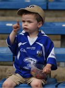5 June 2016; A young Waterford supporter enjoys a snack before the Munster GAA Hurling Senior Championship Semi-Final match between Waterford and Clare at Semple Stadium in Thurles, Co. Tipperary.