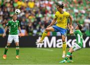 13 June 2016; Zlatan Ibrahimovic of Sweden in action against Wes Hoolahan of Republic of Ireland during the UEFA Euro 2016 Group E match between Republic of Ireland and Sweden at Stade de France in Saint Denis, Paris, France. Photo by Stephen McCarthy/Sportsfile