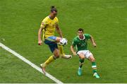 13 June 2016; Zlatan Ibrahimovic of Sweden in action against Wes Hoolahan of Republic of Ireland during the UEFA Euro 2016 Group E match between Republic of Ireland and Sweden at Stade de France in Saint Denis, Paris, France. Photo by Sportsfile