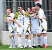 15 July 2010; Sporting Fingal's Glen Crowe, second from right, is congratulated by his team-mates after scoring his side's first goal. UEFA Europa League Second Qualifying Round - 1st Leg, CS Marítimo v Sporting Fingal, Estádio da Madeira, Funchal, Madeira, Portugal. Picture credit: Helder Santos / SPORTSFILE