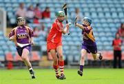 17 July 2010; Orla Cotter, Cork, in action against Josie Dwyer, right, and Michelle O'Leary, Wexford. Gala All-Ireland Senior Championship, Cork v Wexford, Pairc Ui Chaoimh, Cork. Picture credit: Matt Browne / SPORTSFILE