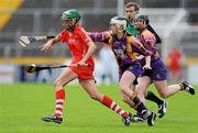 17 July 2010; Orla Cotter, Cork, in action against Kate Kelly and Michelle O'Leary, Wexford. Gala All-Ireland Senior Championship, Cork v Wexford, Pairc Ui Chaoimh, Cork. Picture credit: Matt Browne / SPORTSFILE