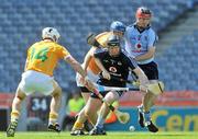 17 July 2010; Gary Maguire and Niall Corcoran, right, Dublin, in action against Liam Watson, left, and Karl McKeegan, Antrim. GAA Hurling All-Ireland Senior Championship Phase 3, Dublin v Antrim, Croke Park, Dublin. Picture credit: Brian Lawless / SPORTSFILE