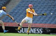 17 July 2010; PJ O'Connell, Antrim, shoots to score his side's first goal despite the attention of Óisín Gough, Dublin. GAA Hurling All-Ireland Senior Championship Phase 3, Dublin v Antrim, Croke Park, Dublin. Picture credit: Brian Lawless / SPORTSFILE