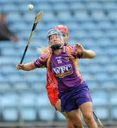 17 July 2010; Katriona Parrock, Wexford, in action against Anna Geary, Cork. Gala All-Ireland Senior Championship, Cork v Wexford, Pairc Ui Chaoimh, Cork. Picture credit: Matt Browne / SPORTSFILE
