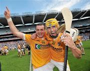17 July 2010; Antrim's Liam Watson, left, celebrates with team-mate Simon McCrory after the game. GAA Hurling All-Ireland Senior Championship Phase 3, Dublin v Antrim, Croke Park, Dublin. Picture credit: Brian Lawless / SPORTSFILE