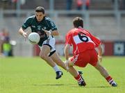 17 July 2010; Eamonn Callaghan, Kildare, in action against Gerard O'Kane, Derry. GAA Football All-Ireland Senior Championship Qualifier Round 3, Derry v Kildare, Celtic Park, Derry. Picture credit: Oliver McVeigh / SPORTSFILE