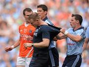 17 July 2010; Philip McMahon, Dublin, clashes with Armagh assistant coach Justin McNulty. GAA Football All-Ireland Senior Championship Qualifier Round 3, Dublin v Armagh, Croke Park, Dublin. Picture credit: David Maher / SPORTSFILE