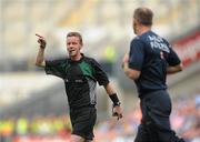 17 July 2010; Referee Joe McQuillan, instructs Armagh assistant coach Justin McNulty to leave the pitch. GAA Football All-Ireland Senior Championship Qualifier Round 3, Dublin v Armagh, Croke Park, Dublin. Picture credit: David Maher / SPORTSFILE
