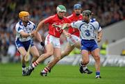 17 July 2010; Niall McCarthy, Cork, in action against Eoin Murphy, left, and Tony Browne, Waterford. Munster GAA Hurling Senior Championship Final Replay, Cork v Waterford, Semple Stadium, Thurles, Co. Tipperary. Picture credit: Ray McManus / SPORTSFILE